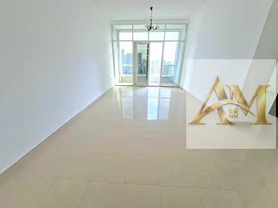 Spacious 1BHK with balcony and built-in wardrobe