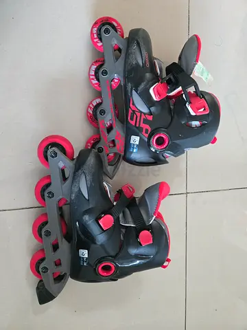 oxelo Pair of black & red adjustable inline skates, size 36-38, lightly used