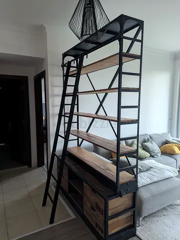 Industrial-style tall shelving unit with ladder - solid wood & metal