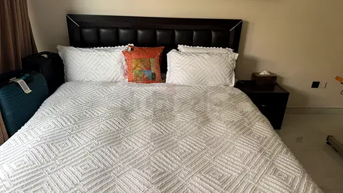 King  bed frame with padded headboard and storage and matching nightstands including mattress