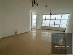 A two-bedroom apartment with a living room, featuring a stunning, full sea view. It is situated in a