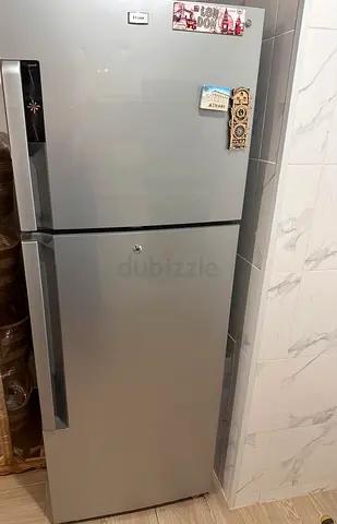Silver Haier Top-Freezer Refrigerator - Good Working Condition