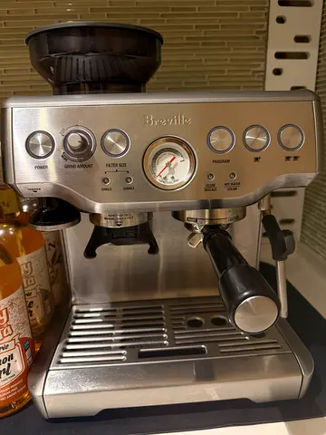 Breville stainless steel espresso machine with built-in grinder (used - 1 year)