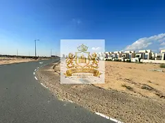 Land for sale in Sharjah... Tilal area... Vacant residential-investment plot... Area: 4,133 sq. ft..