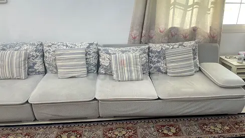 White gloss coffee table with drawer and 10 seater long couch-good condition (price negotiable)