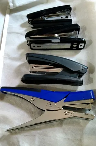 Lot of office staplers and plier stapler - used, working condition