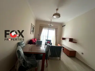 Furnished one-bedroom apartment with a living room available for annual rent; prime location close to all amenities in Al Jurf 2.