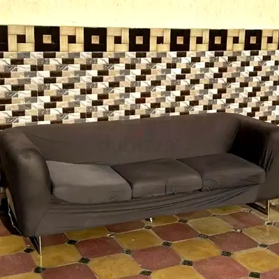 3-seater black fabric sofa in good used condition
