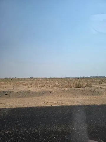 Two adjacent plots of land for sale in Al Sajaa Industrial Area