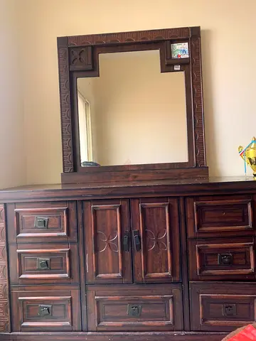A dressing table with mirror