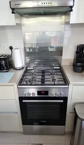 Bosch freestanding gas cooker with oven - stainless steel, good condition