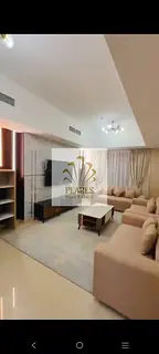 Fully furnished 2BR+Hall apartment for rent in Naeemiya One Tower Al Nuaimiya Ajman. Modern furnitur