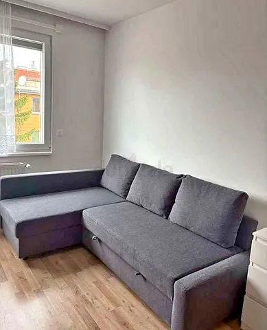 Grey L-shaped Sofa Bed with Storage - Good Condition
