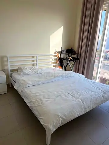 Bed with bed side table