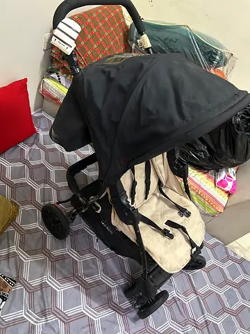 Lightweight black/cream baby stroller - good condition