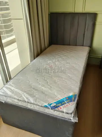 Single bed with mattress and upholstered headboard - good condition