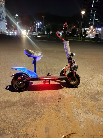 Used Electric Scooter with Seat and LED Lights — Good Condition
