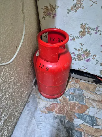 Used Red LPG Gas Cylinder (12kg) now empty