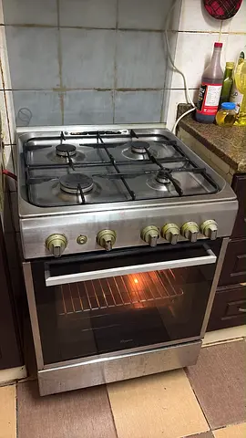 Used 4-Burner Freestanding Gas Stove with Oven - Good Working Condition including gas cylinder