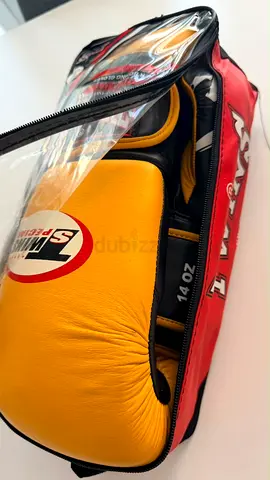 Used pair of 14oz yellow boxing gloves with carry case