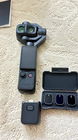 DJI Osmo Pocket 4p handheld gimbal camera with ND filters and accessories