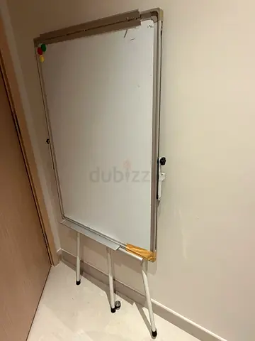 White board with sponge and colorful pens