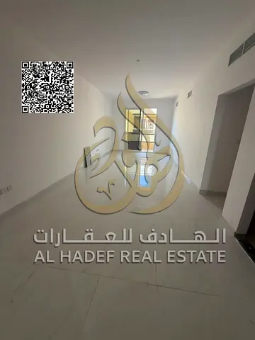 Two-bedroom apartment with a living room in Al Muweihat 3, brand new building, first occupant, two master bedrooms, 3 bathrooms and a balcony, near Aj