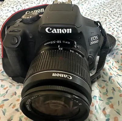 Canon EOS 2000D DSLR with EF-S 18-55mm Kit Lens - Good Working Condition,only cam & lens with caps