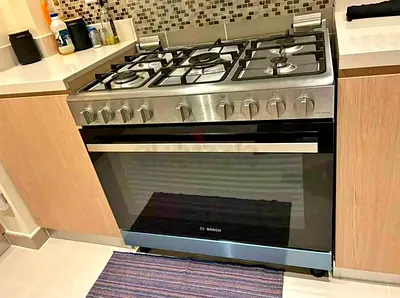 Bosch freestanding gas cooker with oven - stainless steel