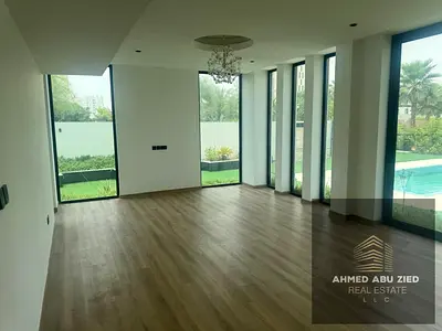 Villa for sale in Al Zorah The property features a ground floor, a first floor, a perimeter wall, a garden, and a swimming pool. Total land area: 6,00