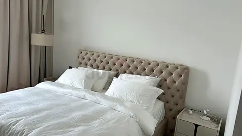 Beige queen sized bed