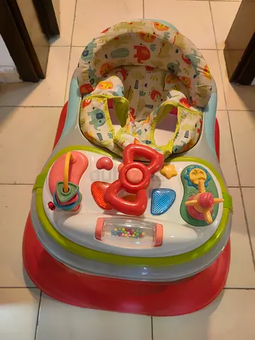 Baby walker with activity tray and padded seat - good used condition