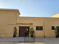 Arabic House for Annual Rent in Al Sabkha Sharjah featuring 4 bedrooms 3 bathrooms and a private yar