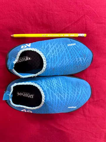 Atlantis water park, Pair of blue water shoes / aqua socks, size not specified, light use