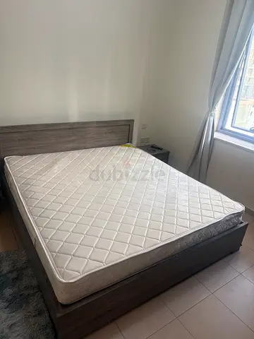 Queen bed frame with mattress