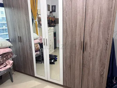 6 door mirrored wardrobe in good condition - oak finish