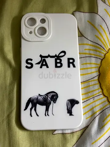 White customized iPhone 15 silicone case with 'SABR' and camel design-ALL 90 dirham
