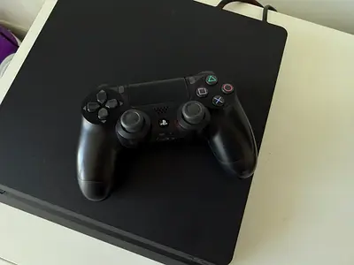 Sony PlayStation 4 Slim with DualShock 4 Controller - Excellent condition