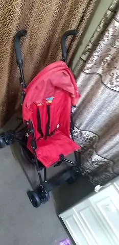 Red lightweight umbrella stroller - good condition