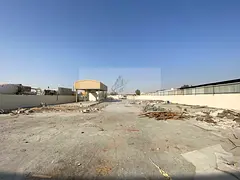 20,000 Sq Ft Industrial Yard in Al Sajaa with Interlock Flooring, Covered Shed, 32 KW Electricity, O