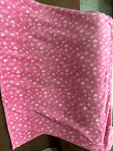 Soft pink baby blanket with prints - gently used