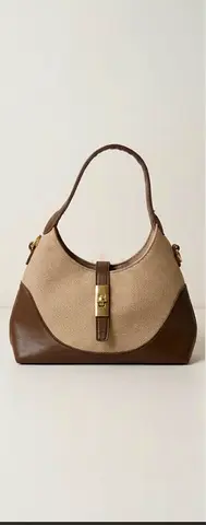 Beige and brown shoulder handbag with gold-tone clasp