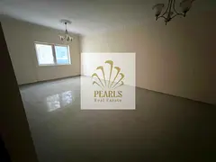 2BR in Al Nuaimiya 3, Khalifa St, near Grand Mall. 2 baths, open-view balcony, families only. AED 42