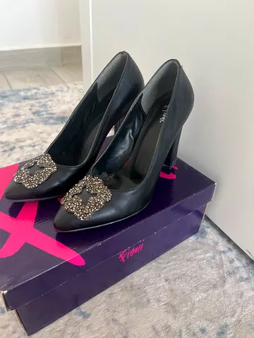 Black pointed heels with decorative crystal buckles, EU 38