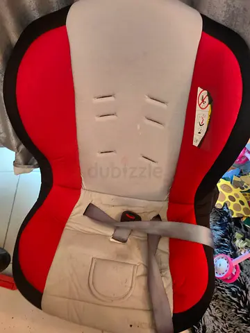 Used red and grey toddler car seat — good condition