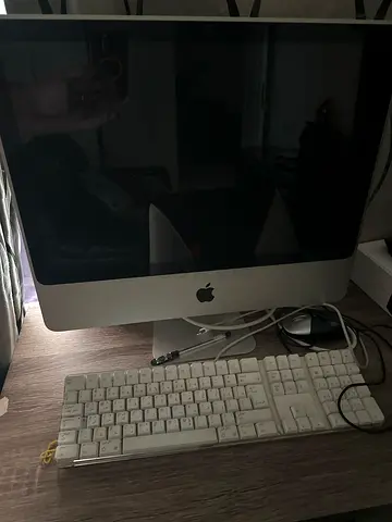 iMac monitor and keyboard with mouse