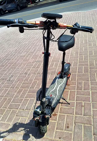 Used electric scooter with seat - good working condition
