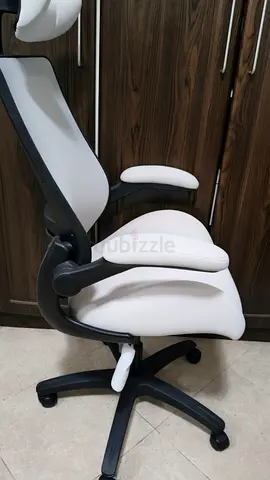 Ergonomic white office chair with headrest and lumbar support