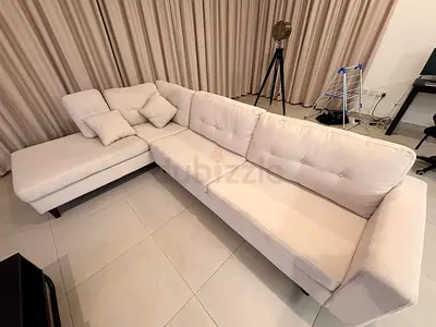 Light beige L-shaped fabric sofa — 3-seater with chaise