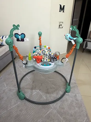 Baby Jumper/Exersaucer with Toys - Good Condition